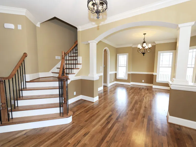 Finished two-tone dining room with columns